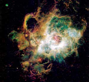 Огромное, протяженностью 1500 световых лет, газовое облако NGC 604 в галактике М33 породило недавно около 200 горячих гигантских звезд. Это один из важных процессов эволюции галактики.